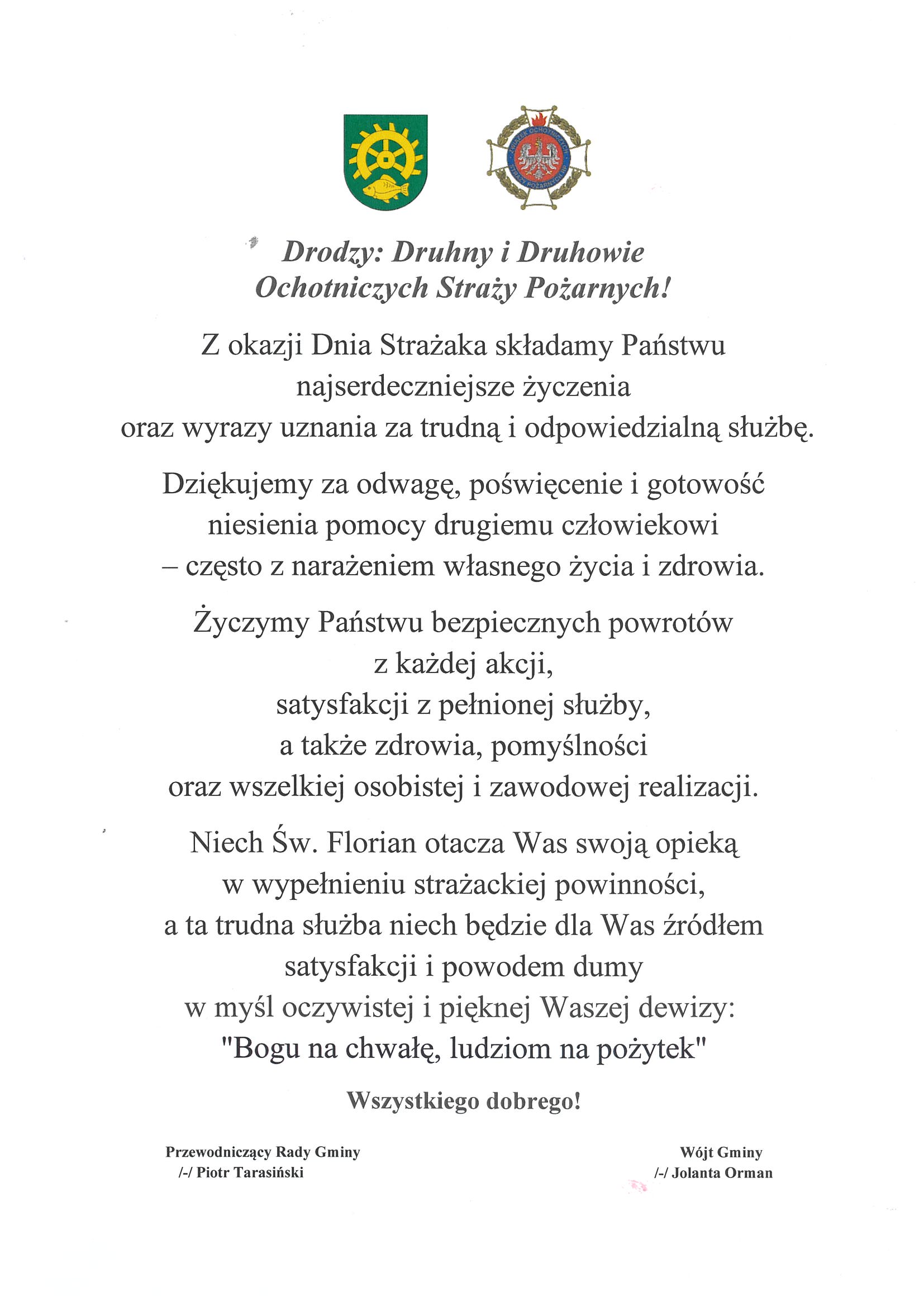 Plakat z życzeniami z okazji Dnia Strażaka. U góry znajdują się dwa kolorowe herby: po lewej herb gminy, po prawej emblemat strażacki. Poniżej umieszczony jest tekst życzeń skierowany do druhen i druhów Ochotniczych Straży Pożarnych, wyrażający podziękowania za odwagę, poświęcenie i służbę oraz życzenia zdrowia, pomyślności i bezpiecznych powrotów z akcji. W treści znajduje się również odwołanie do opieki św. Floriana oraz strażackiej dewizy „Bogu na chwałę, ludziom na pożytek”. Na dole znajdują się podpisy: Przewodniczącego Rady Gminy i Wójta Gminy.