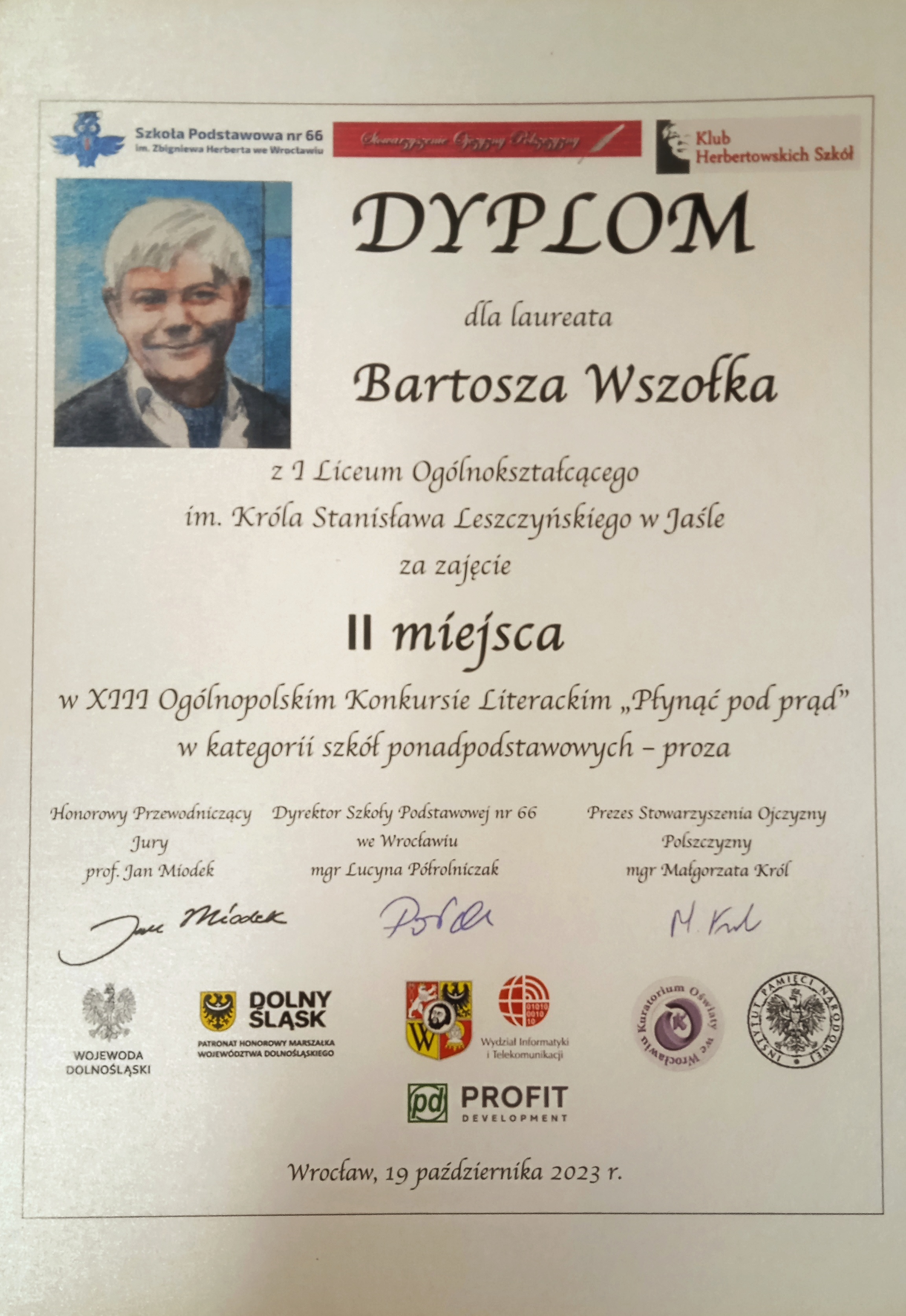 Dyplom dla Bartosza Wszołka
