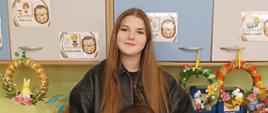 Rodzice z dziećmi prezentują warsztatów