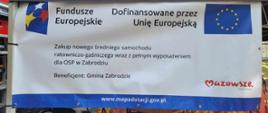 Fundusze Europejskie. Dofinansowane przez Unię Europejską. Zakup nowego średniego samochodu ratowniczo-gaśniczego wraz z pełnym wyposażeniem dla OSP w Zabrodziu