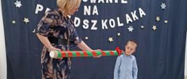 Pasowanie na przedszkolaka z udziałem dzieci i Pani Dyrektor.
