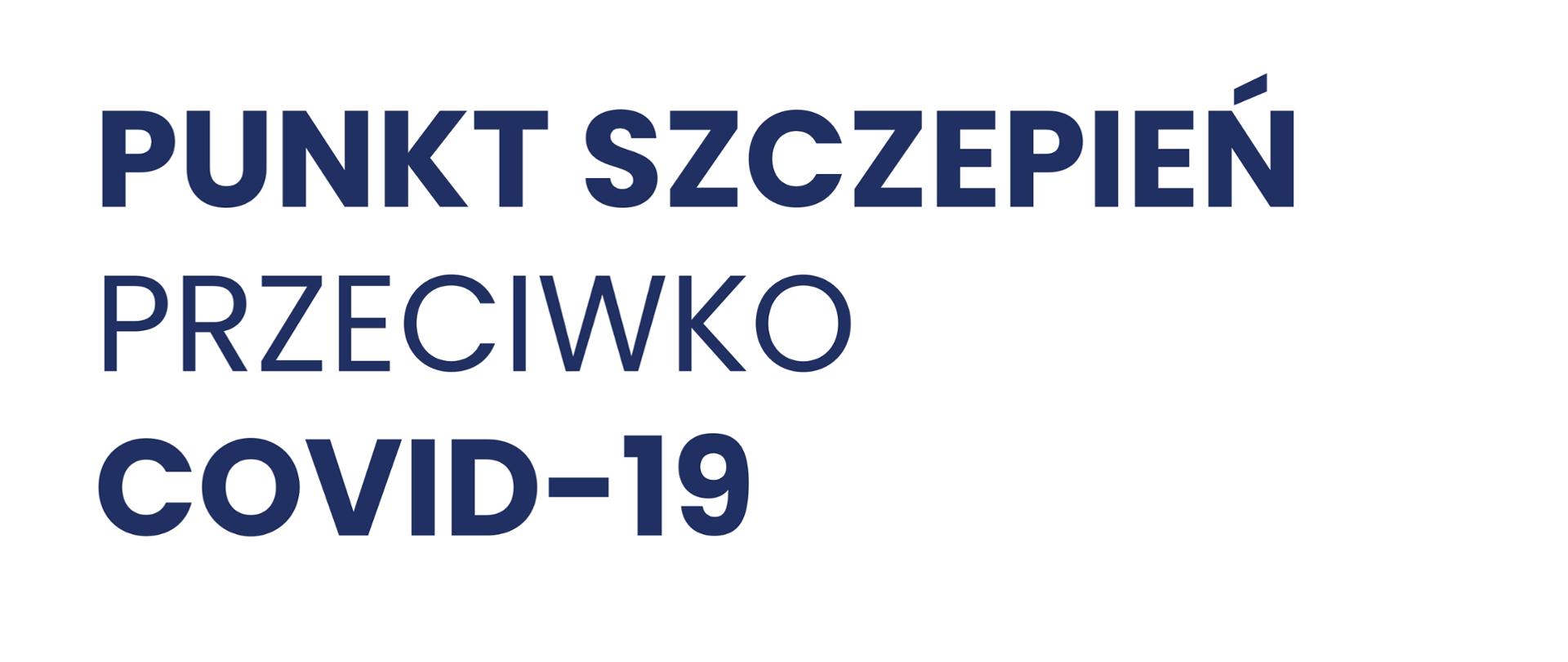 Niebieski napis na białym tle "Punkt szczepień przeciwko COVID - 19"