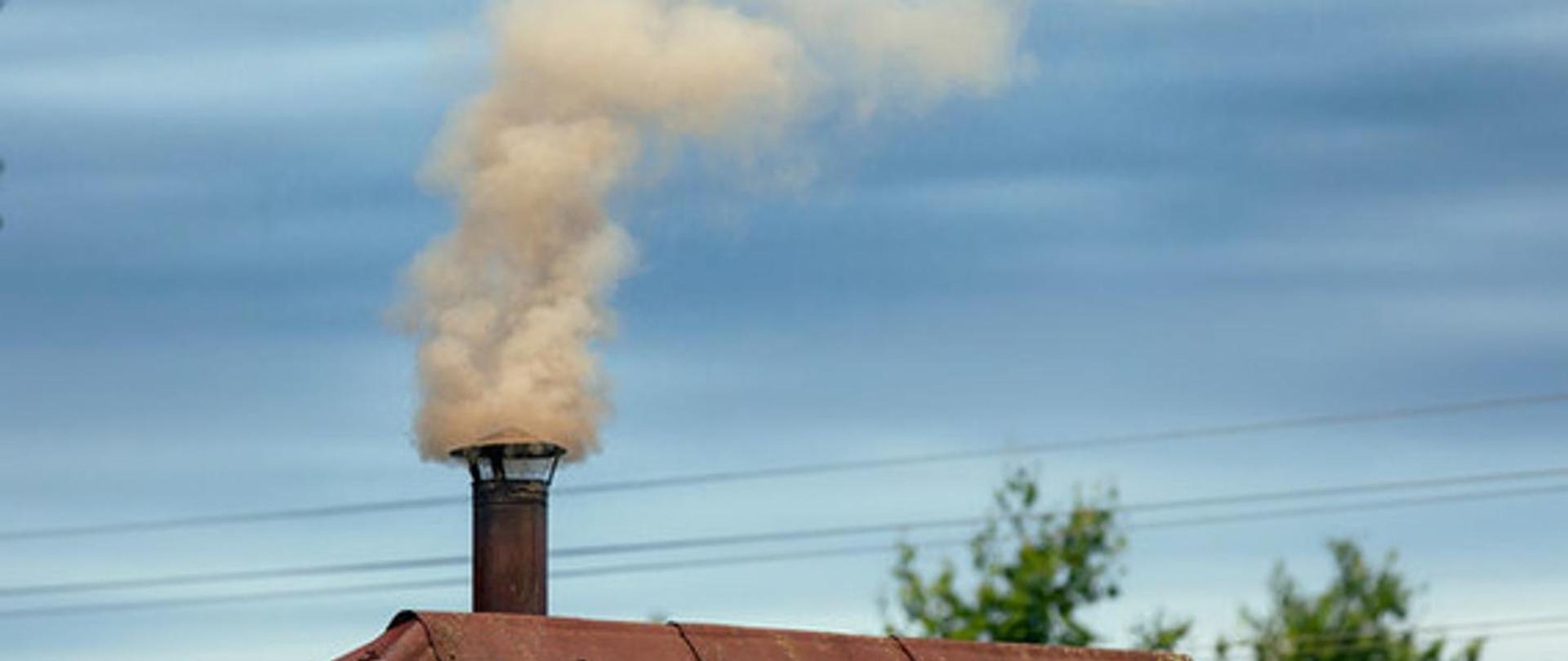 grafika przedstawia dym z komina