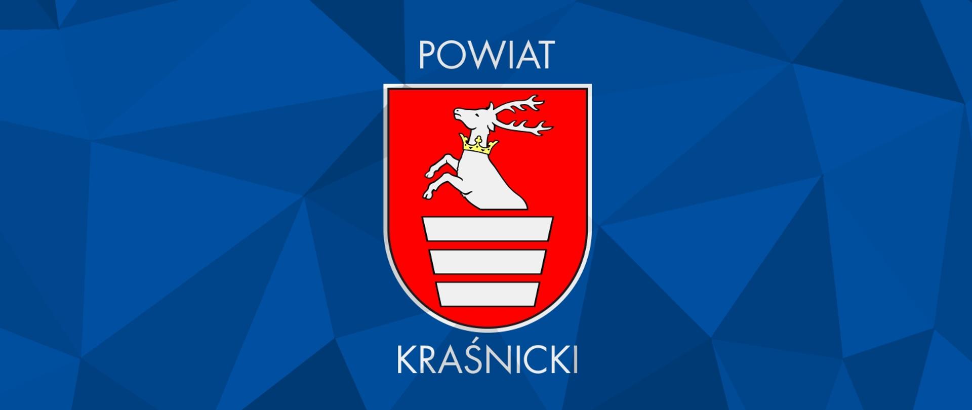 Grafika przedstawia niebieskie tło, na którym znajduje się Herb Powiatu Kraśnickiego wraz z podpisem.