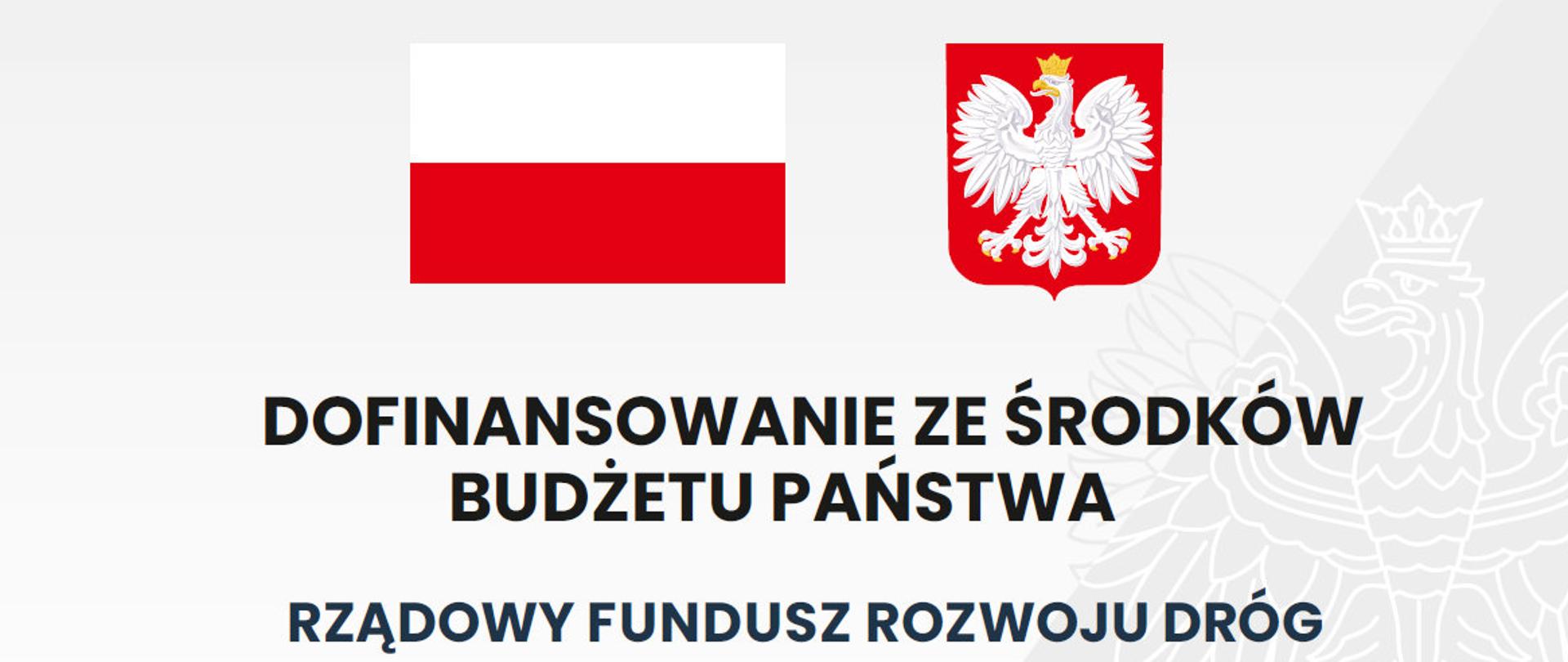 Tablica informacyjna inwestycji zrealizowanej dzięki dofinansowaniu ze Środków Rządowego Funduszu Rozwoju Dróg - nazwa zadania, kwota dofinansowania, wartość inwestycji, flaga i godło Polski