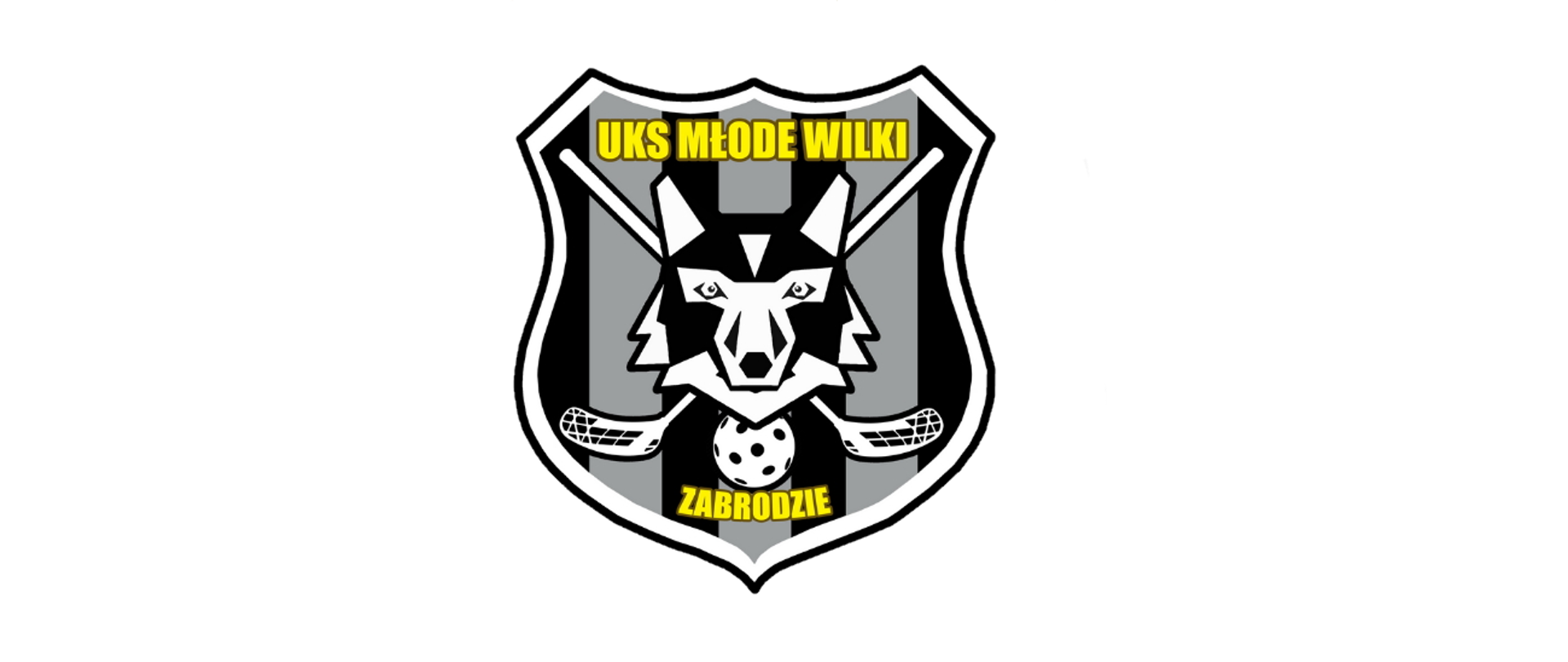 Logo z głową wilka, za nią skrzyżowane 2 kije do unihokeja i piłka. UKS Młode Wilki Zabrodzie. 