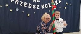 Pasowanie na przedszkolaka z udziałem dzieci i Pani Dyrektor.