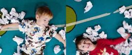 Zabawy ze śniegiem - dzieci pozują do zdjęcia wśród papierowych kul